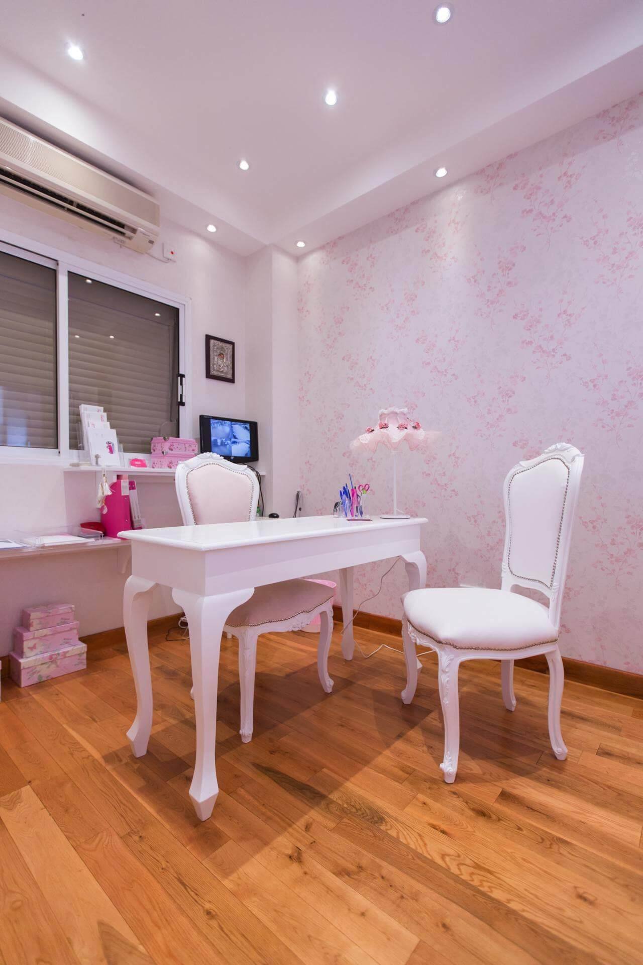 The white reception desk by the window